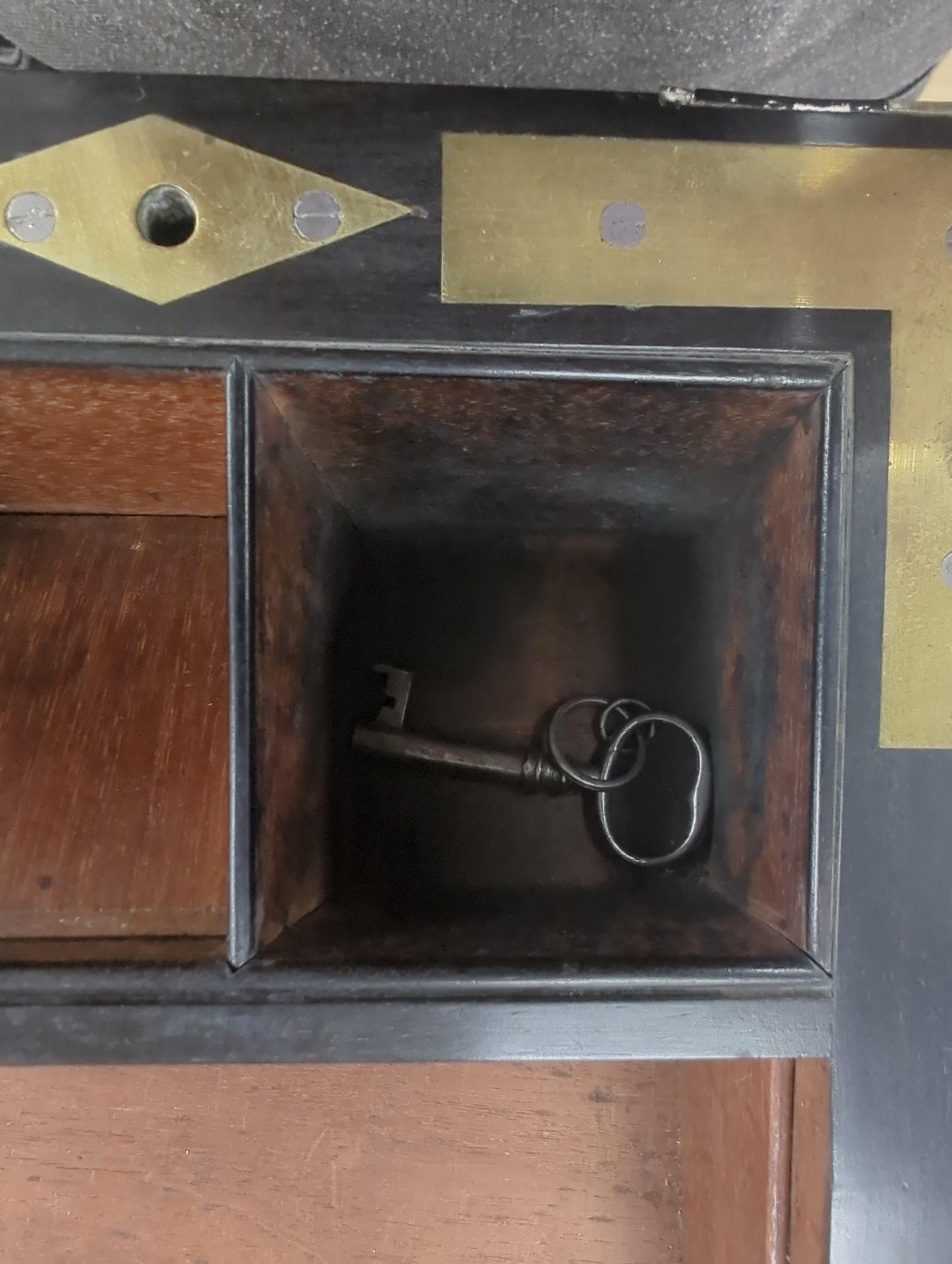 A George III mahogany, ebony and brass-mounted ship's writing box by Wells & Co., screw fixings to each side with original key, 50.5cm x 30cm x 19.5cm